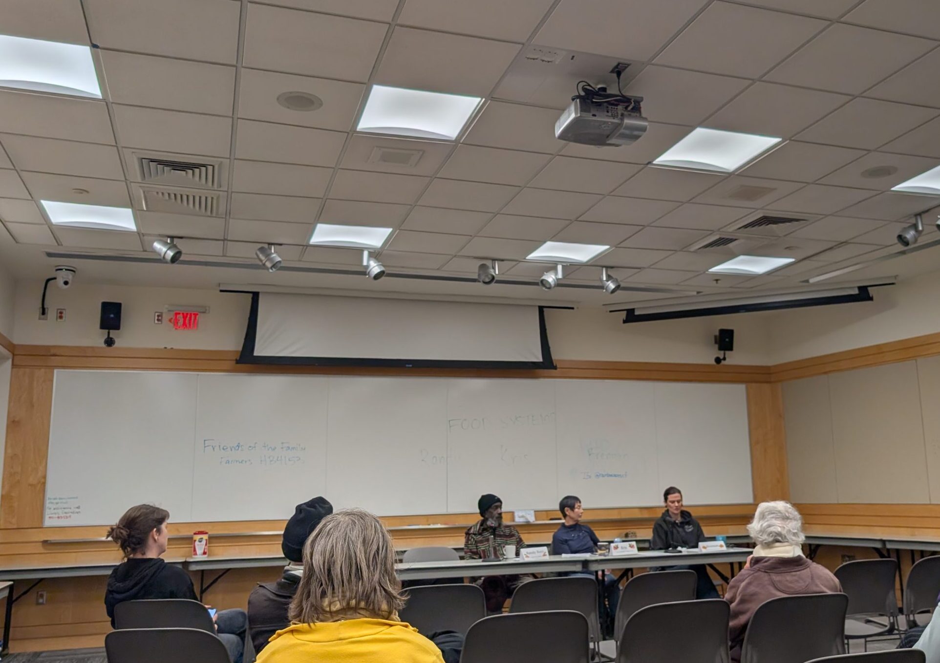Speakers at the library panel